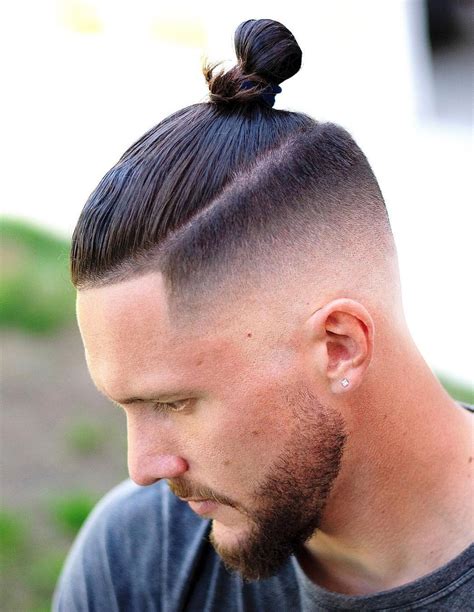 fade haircut man bun|man bun with sides cut.